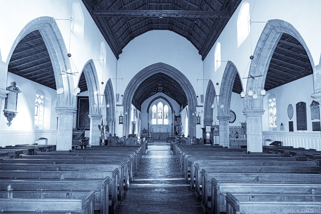 Sunlight streaming into a church sanctuary